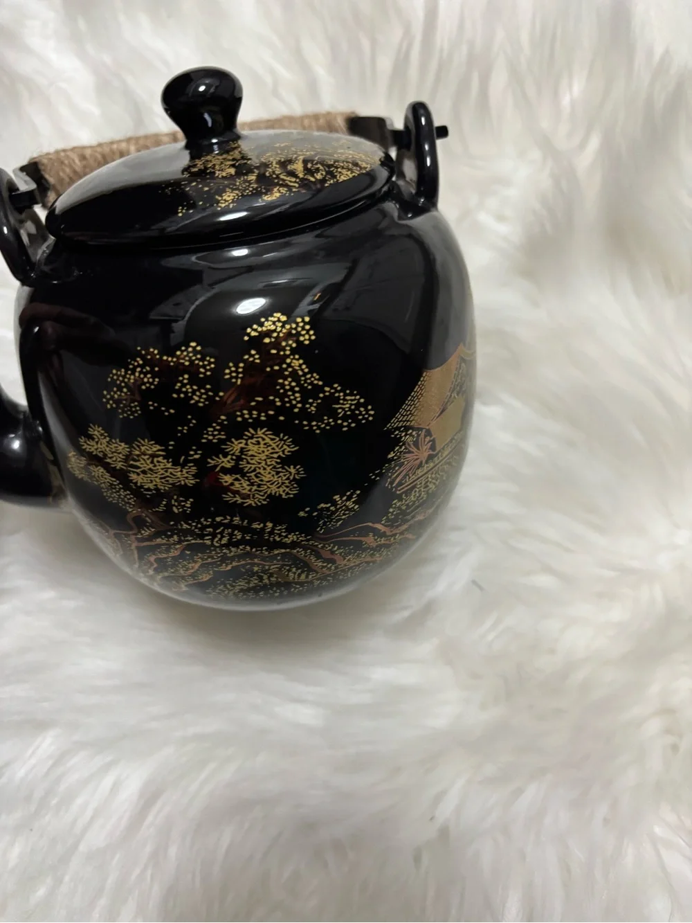 Black and Gold Ceramic Teapot with Woven Handle